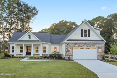 This brand new Riptide home with stunning setting and finishes on Sea Trail Golf Resort in North Carolina - for sale on GolfHomes.com, golf home, golf lot