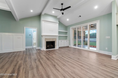 This brand new Riptide home with stunning setting and finishes on Sea Trail Golf Resort in North Carolina - for sale on GolfHomes.com, golf home, golf lot