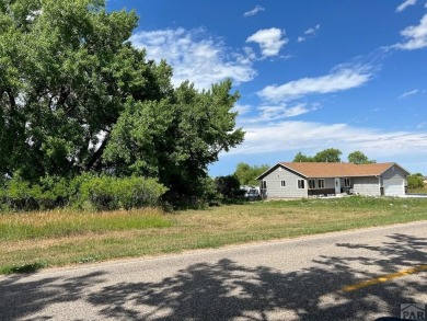 Escape the hustle without giving up convenience! This nearly on Hollydot Golf Course in Colorado - for sale on GolfHomes.com, golf home, golf lot