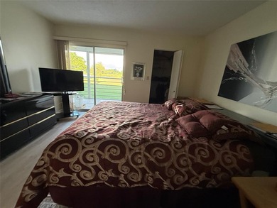 YOU CAN CHANGE THE INSIDE BUT CAN'T CHANGE THE OUTSIDE. Original on Wynmoor Golf Course in Florida - for sale on GolfHomes.com, golf home, golf lot