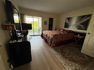 YOU CAN CHANGE THE INSIDE BUT CAN'T CHANGE THE OUTSIDE. Original on Wynmoor Golf Course in Florida - for sale on GolfHomes.com, golf home, golf lot