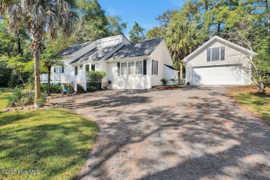 Tucked beneath the canopy of Southport's iconic old-growth oak on The Lakes Country Club in North Carolina - for sale on GolfHomes.com, golf home, golf lot