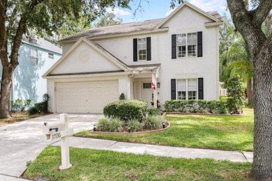 Welcome to true Florida indoor, outdoor, and community living on Hunters Green Country Club in Florida - for sale on GolfHomes.com, golf home, golf lot