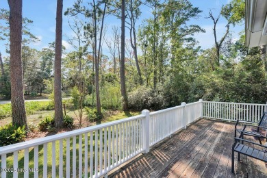 Tucked beneath the canopy of Southport's iconic old-growth oak on The Lakes Country Club in North Carolina - for sale on GolfHomes.com, golf home, golf lot