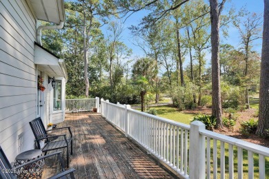 Tucked beneath the canopy of Southport's iconic old-growth oak on The Lakes Country Club in North Carolina - for sale on GolfHomes.com, golf home, golf lot