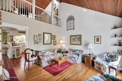 Tucked beneath the canopy of Southport's iconic old-growth oak on The Lakes Country Club in North Carolina - for sale on GolfHomes.com, golf home, golf lot