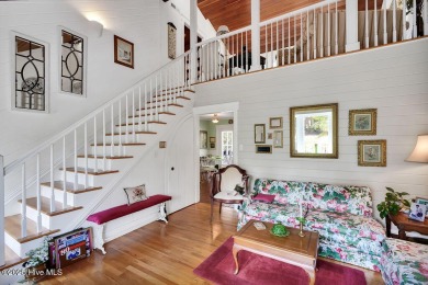 Tucked beneath the canopy of Southport's iconic old-growth oak on The Lakes Country Club in North Carolina - for sale on GolfHomes.com, golf home, golf lot
