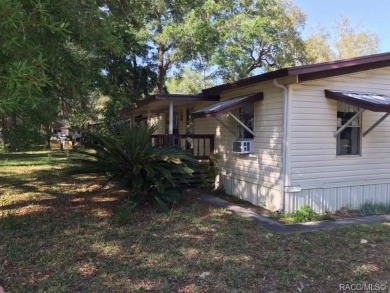 Here is a great 3/2 doublewide mobile home with an upgraded on Chiefland Golf and Country Club in Florida - for sale on GolfHomes.com, golf home, golf lot