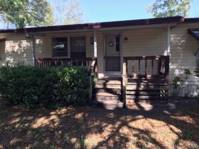 Here is a great 3/2 doublewide mobile home with an upgraded on Chiefland Golf and Country Club in Florida - for sale on GolfHomes.com, golf home, golf lot