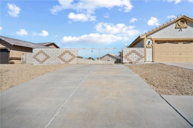 Pool home in Desert Lakes golf course community on a quarter on Desert Lakes Golf Course in Arizona - for sale on GolfHomes.com, golf home, golf lot