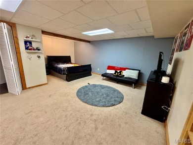 This 4-bedroom, 3-bath beauty in the desirable Fairway Estates on Bent Creek Golf Course in Missouri - for sale on GolfHomes.com, golf home, golf lot