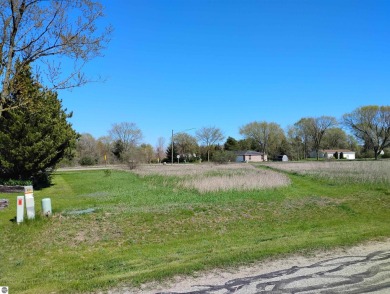Beautiful lot at all sports private Lake Isabella with road on The Pines Golf Course at Lake Isabella in Michigan - for sale on GolfHomes.com, golf home, golf lot