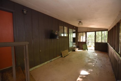 Charming Fixer-Upper with Endless Potential Near Fairfield Bay on Mountain Ranch Golf Club in Arkansas - for sale on GolfHomes.com, golf home, golf lot