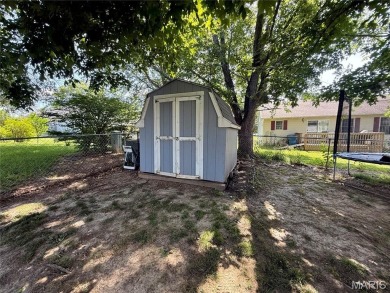 This 4-bedroom, 3-bath beauty in the desirable Fairway Estates on Bent Creek Golf Course in Missouri - for sale on GolfHomes.com, golf home, golf lot