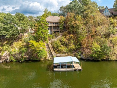 Located in the Diamondhead Community this custom waterfront home on Diamondhead Golf and Country Club in Arkansas - for sale on GolfHomes.com, golf home, golf lot