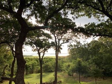Ready to build your dream home that overlooks Lake Bridgeport. 2 on The Club At Runaway Bay in Texas - for sale on GolfHomes.com, golf home, golf lot