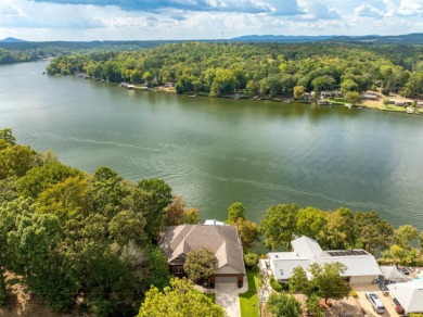 Located in the Diamondhead Community this custom waterfront home on Diamondhead Golf and Country Club in Arkansas - for sale on GolfHomes.com, golf home, golf lot