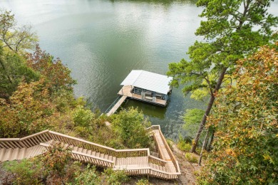 Located in the Diamondhead Community this custom waterfront home on Diamondhead Golf and Country Club in Arkansas - for sale on GolfHomes.com, golf home, golf lot