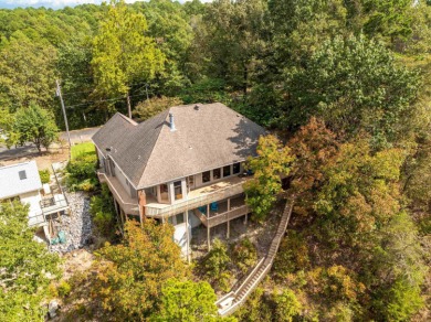 Located in the Diamondhead Community this custom waterfront home on Diamondhead Golf and Country Club in Arkansas - for sale on GolfHomes.com, golf home, golf lot