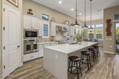 Enjoy sophisticated lock-n-leave living in this impeccably on Whisper Rock Golf Club  in Arizona - for sale on GolfHomes.com, golf home, golf lot