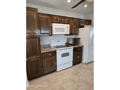 Welcome to this beautifully maintained St. Tropez model end unit on Leisure Village West Assoc. in New Jersey - for sale on GolfHomes.com, golf home, golf lot