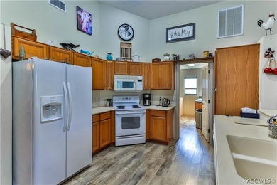 Sugarmill Woods Classic Driftwood model single-family pool home on Sugarmill Woods Golf and Country Club in Florida - for sale on GolfHomes.com, golf home, golf lot