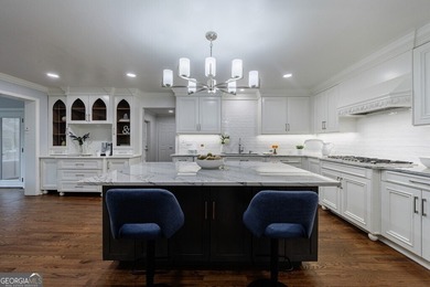 Prepare to be captivated by this storybook stone estate, a rare on Atlanta Country Club in Georgia - for sale on GolfHomes.com, golf home, golf lot