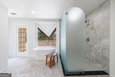 Prepare to be captivated by this storybook stone estate, a rare on Atlanta Country Club in Georgia - for sale on GolfHomes.com, golf home, golf lot