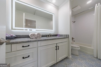 Prepare to be captivated by this storybook stone estate, a rare on Atlanta Country Club in Georgia - for sale on GolfHomes.com, golf home, golf lot