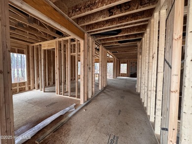 This Granville model boasts spacious great room with an electric on Legacy Golf Links in North Carolina - for sale on GolfHomes.com, golf home, golf lot