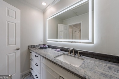 Prepare to be captivated by this storybook stone estate, a rare on Atlanta Country Club in Georgia - for sale on GolfHomes.com, golf home, golf lot