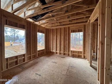 This Granville model boasts spacious great room with an electric on Legacy Golf Links in North Carolina - for sale on GolfHomes.com, golf home, golf lot