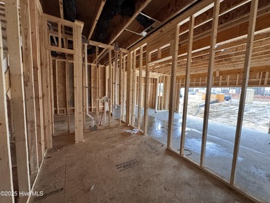 This Granville model boasts spacious great room with an electric on Legacy Golf Links in North Carolina - for sale on GolfHomes.com, golf home, golf lot