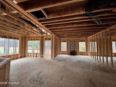 This Granville model boasts spacious great room with an electric on Legacy Golf Links in North Carolina - for sale on GolfHomes.com, golf home, golf lot