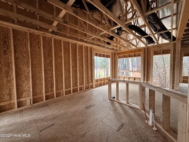 This Granville model boasts spacious great room with an electric on Legacy Golf Links in North Carolina - for sale on GolfHomes.com, golf home, golf lot