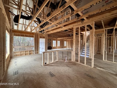 This Granville model boasts spacious great room with an electric on Legacy Golf Links in North Carolina - for sale on GolfHomes.com, golf home, golf lot