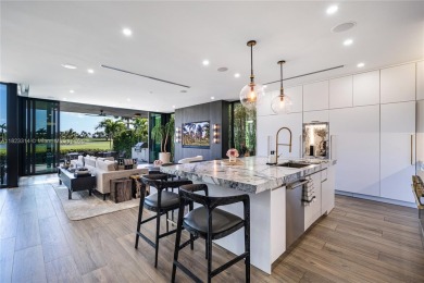Golfers' paradise! Contemporary luxurious home nestled on on La Gorce Country Club in Florida - for sale on GolfHomes.com, golf home, golf lot