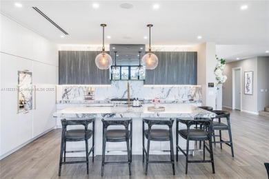 Golfers' paradise! Contemporary luxurious home nestled on on La Gorce Country Club in Florida - for sale on GolfHomes.com, golf home, golf lot