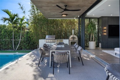 Golfers' paradise! Contemporary luxurious home nestled on on La Gorce Country Club in Florida - for sale on GolfHomes.com, golf home, golf lot