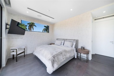 Golfers' paradise! Contemporary luxurious home nestled on on La Gorce Country Club in Florida - for sale on GolfHomes.com, golf home, golf lot