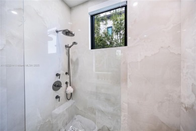 Golfers' paradise! Contemporary luxurious home nestled on on La Gorce Country Club in Florida - for sale on GolfHomes.com, golf home, golf lot