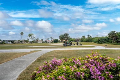 Introducing this serene haven at 10214 Windsong Rd, Punta Gorda on Seminole Lakes Country Club in Florida - for sale on GolfHomes.com, golf home, golf lot