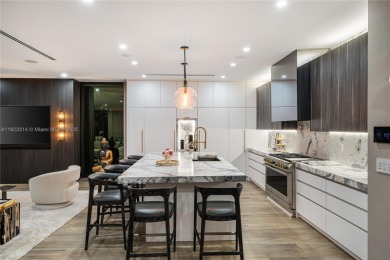 Golfers' paradise! Contemporary luxurious home nestled on on La Gorce Country Club in Florida - for sale on GolfHomes.com, golf home, golf lot