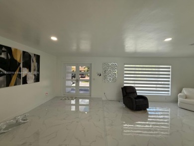 Desirable location COUNTRY CLUB OF MIAMI with stunning golf on  in Florida - for sale on GolfHomes.com, golf home, golf lot