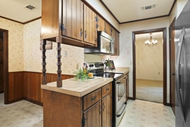 Lakefront Living... Welcome home to this 3BD / 2BA with separate on Pine Creek Golf Club in Mississippi - for sale on GolfHomes.com, golf home, golf lot