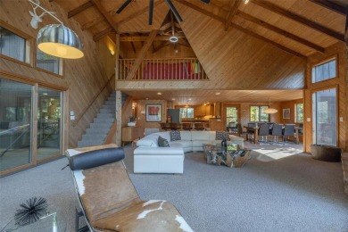 This stunning, fully furnished 4 bed and 2 bath lakefront chalet on Innsbrook Resort Golf Course in Missouri - for sale on GolfHomes.com, golf home, golf lot