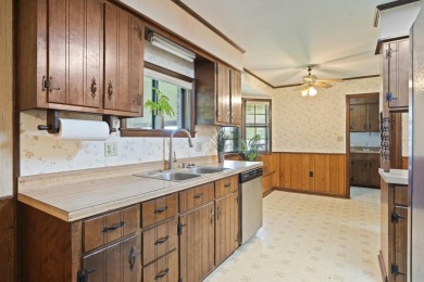 Lakefront Living... Welcome home to this 3BD / 2BA with separate on Pine Creek Golf Club in Mississippi - for sale on GolfHomes.com, golf home, golf lot