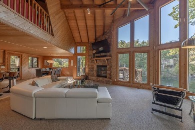 This stunning, fully furnished 4 bed and 2 bath lakefront chalet on Innsbrook Resort Golf Course in Missouri - for sale on GolfHomes.com, golf home, golf lot