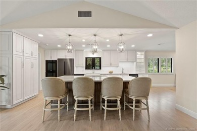 Located in the gated and exclusive community of Pipers Landing ( on Pipers Landing Country Club in Florida - for sale on GolfHomes.com, golf home, golf lot