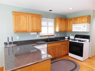 Immaculate and lovingly cared for home featuring 3 bedrooms and on Maple Lane Golf Club in Michigan - for sale on GolfHomes.com, golf home, golf lot